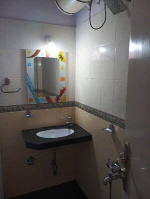 Bathroom in 2 BHK Apartment at Rustomjee Riviera, Malad West – for Rent