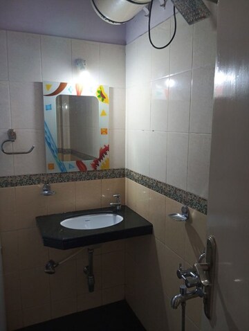 Bathroom in 2 BHK Apartment at Rustomjee Riviera, Malad West – for Rent