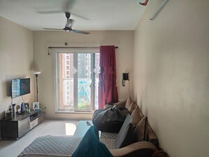 Living Room in 2 BHK Apartment at Dosti West County, Balkum Pada – for Sale