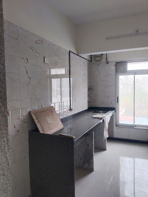 Kitchen in 1 BHK Apartment at Ani Anu Sri Balaji Enclave, Malad West – for Sale
