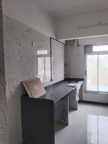 Kitchen in 1 BHK Apartment at Ani Anu Sri Balaji Enclave, Malad West – for Sale