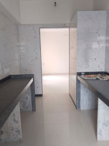 Kitchen in 1 BHK Apartment at Ani Anu Sri Balaji Enclave, Malad West – for Sale