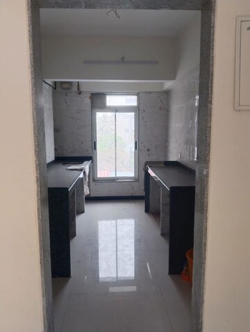 Kitchen in 1 BHK Apartment at Ani Anu Sri Balaji Enclave, Malad West – for Sale
