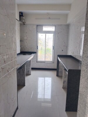 Kitchen in 1 BHK Apartment at Ani Anu Sri Balaji Enclave, Malad West – for Sale