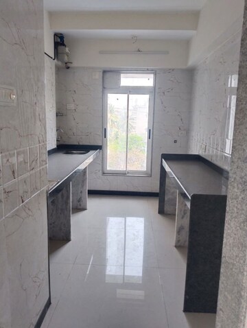 Kitchen in 1 BHK Apartment at Ani Anu Sri Balaji Enclave, Malad West – for Sale
