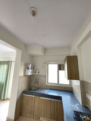 Kitchen in 2 BHK Apartment at Gardenia Gateway, Sector 75 – for Rent