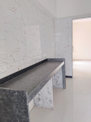 Kitchen in 1 BHK Apartment at Ani Anu Sri Balaji Enclave, Malad West – for Sale