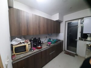 Kitchen in 3 BHK Apartment at Microtek Greenburg, Sector 86 – for Rent