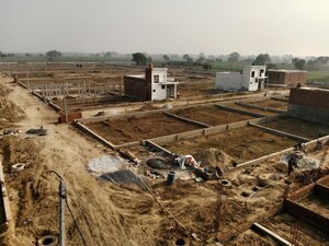 Plot Area in  Plot at Dhanauli – for Sale