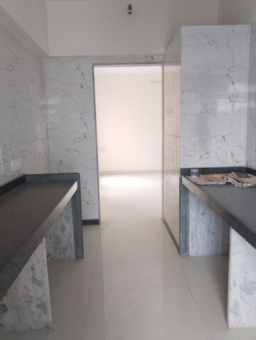 Kitchen in 1 BHK Apartment at Ani Anu Sri Balaji Enclave, Malad West – for Sale