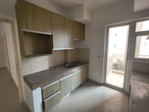 Kitchen in 3 BHK Apartment at Emaar Gurgaon Greens, Sector 102 – for Sale