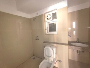 Bathroom in 3 BHK Apartment at Emaar Gurgaon Greens, Sector 102 – for Sale