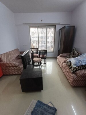 Living Room in 2 BHK Apartment at K Raheja Heights, Malad East – for Rent
