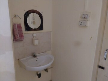 Bathroom in 2 BHK Apartment at K Raheja Heights, Malad East – for Rent