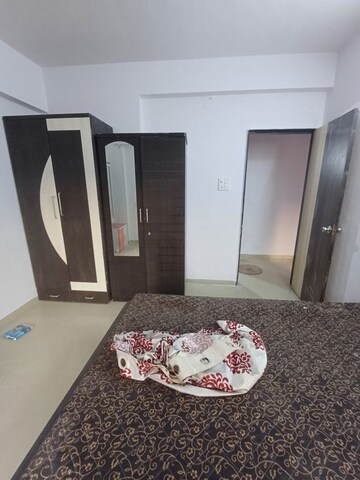 Bedroom in 2 BHK Apartment at K Raheja Heights, Malad East – for Rent