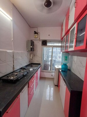Kitchen in 2 BHK Apartment at K Raheja Heights, Malad East – for Rent