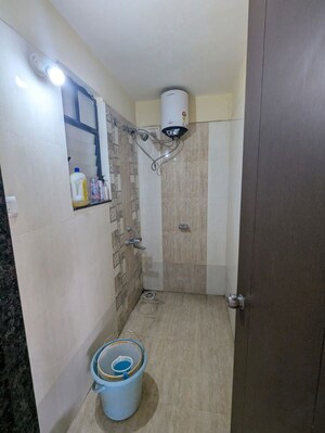 Bathroom in 1 BHK Apartment at GK Dwarka Sai, Rahatani – for Rent