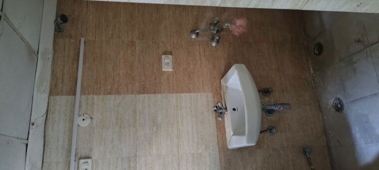 Bathroom, aditya-world-city-residences 2 Bedroom 858 Sq.Ft. Apartment In Shahpur Bamheta Ghaziabad 10008182