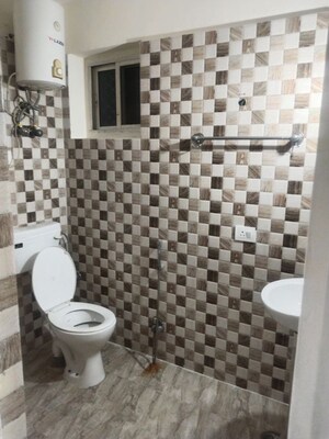 Bathroom in 2 BHK Apartment at Shipra Suncity, Vaibhav Khand – for Rent