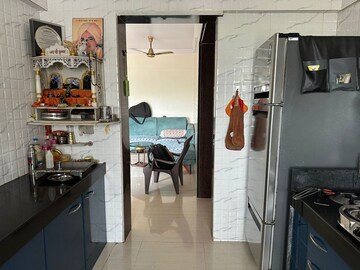 Kitchen in 2 BHK Apartment at Unnatti Greens Phase VII, Ghodbunder Road – for Rent