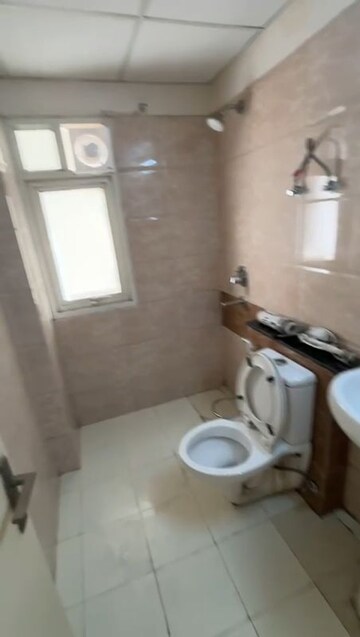 Bathroom in 2 BHK Apartment at Wave Executive Floors, Wave City – for Rent