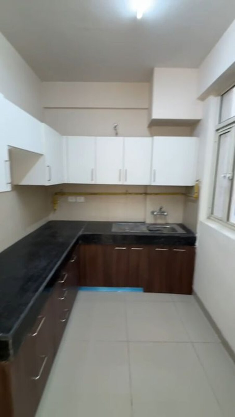 Kitchen, wave-executive-floors 2 Bedroom 900 Sq.Ft. Apartment In Wave City Ghaziabad 10008615