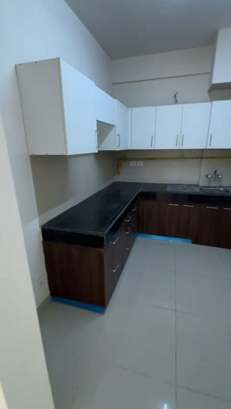 Kitchen, wave-executive-floors 2 Bedroom 900 Sq.Ft. Apartment In Wave City Ghaziabad 10008615