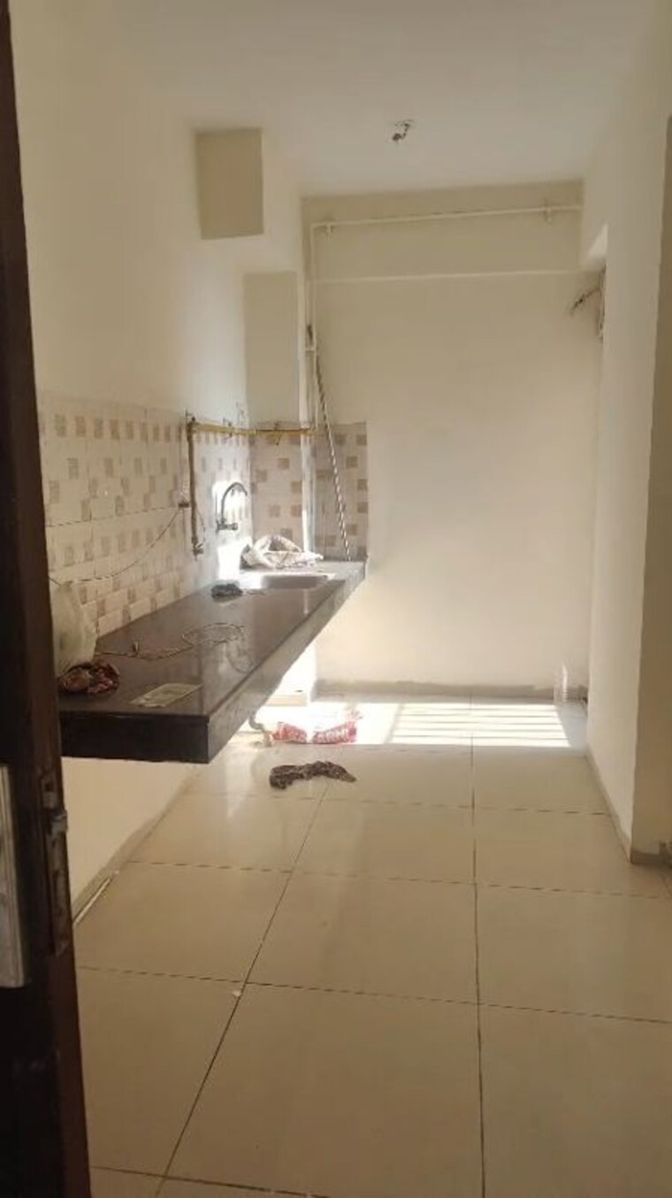 Kitchen, wave-dream-homes 2 Bedroom 808 Sq.Ft. Apartment In Wave City Ghaziabad 10008656
