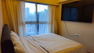 Bedroom in 2 BHK Apartment at Shapoorji Pallonji Astron, Kandivali East – for Rent