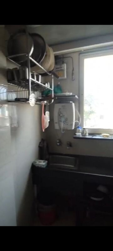 Kitchen in 3 BHK Apartment at Highway Rose CHS, Vile Parle East – for Rent