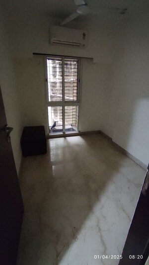 Room in 2 BHK Apartment at Omkar Meridia, Kurla West – for Rent