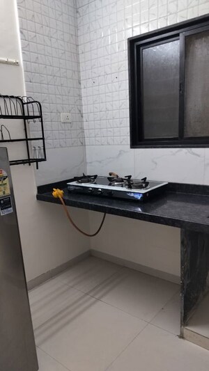 Kitchen in 1 BHK Apartment at Wadgaon Sheri – for Rent