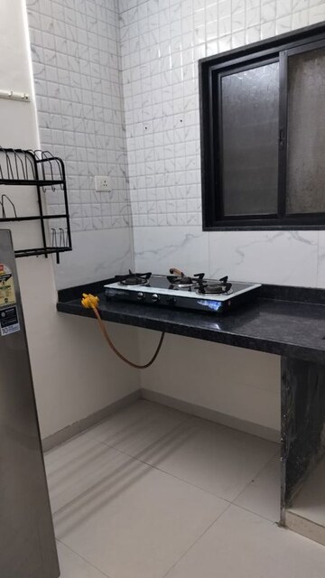 Kitchen in 1 BHK Apartment at Wadgaon Sheri – for Rent