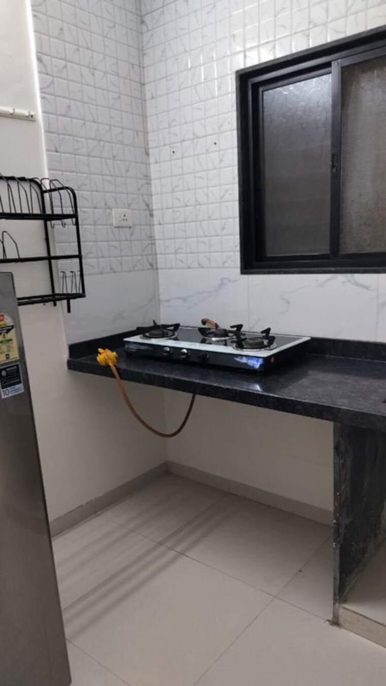 Kitchen, wadgaon sheri 1 Bedroom 600 Sq.Ft. Apartment In Wadgaon Sheri Pune 10008735