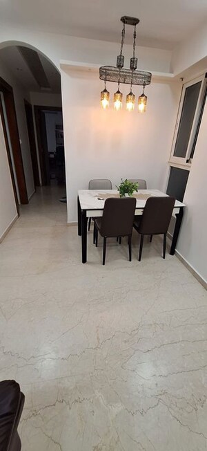 Living Room in 2 BHK Apartment at Courtyard by Narang Realty and The Wadhwa Group, Pokhran Road No Two – for Rent