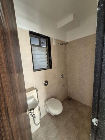 Bathroom in 1 BHK Apartment at UK Iridium, Kandivali East – for Rent