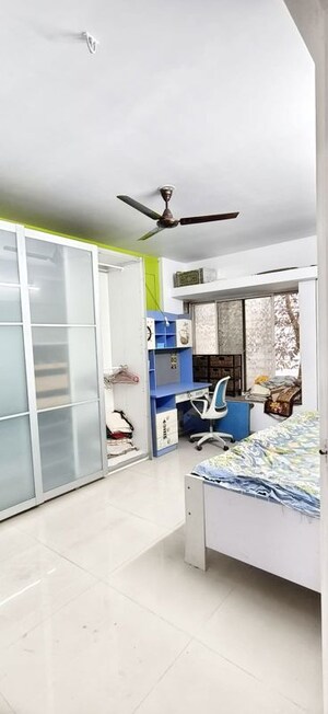 Bedroom in 2 BHK Apartment at Punyadham Society, Wadgaon Sheri – for Rent