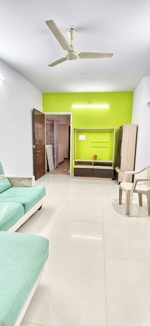 Living Room in 2 BHK Apartment at Punyadham Society, Wadgaon Sheri – for Rent