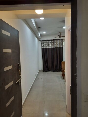 Building Lobby in 2 BHK Apartment at Galaxy Royale, Gaur City 2 – for Rent