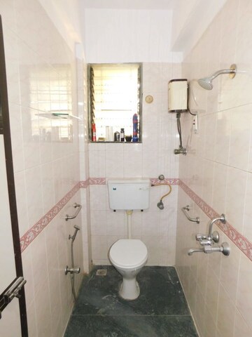 Attached Bathroom in 3 BHK Apartment at Julias Wadi CHS, Goregaon East – for Rent