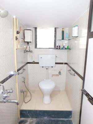 Bathroom in 3 BHK Apartment at MP Pandurangwadi Laxmi Niwas CHS, Goregaon East – for Rent