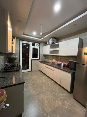 Kitchen in 4 BHK Builder Floor at AWHO Apartments, Sector 22 – for Rent