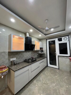 Kitchen in 4 BHK Builder Floor at AWHO Apartments, Sector 22 – for Rent