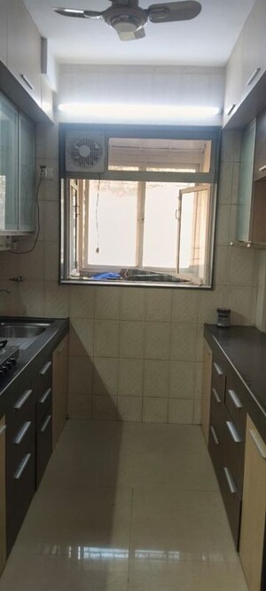 Kitchen in 1 BHK Apartment at Thakur Gayatri Satsang, Kandivali East – for Rent