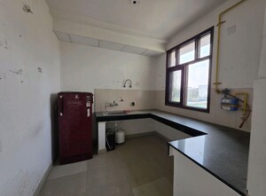 Kitchen in 2.5 BHK Builder Floor at Wave Floors, Mahurali – for Sale