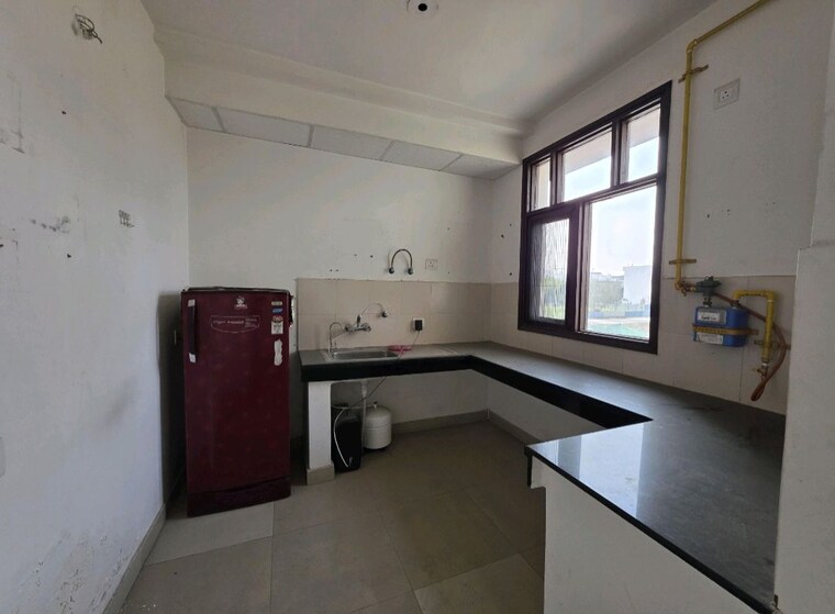 Kitchen, wave-floors 2.5 Bedroom 194 Sq.Yd. Builder Floor In Mahurali Ghaziabad 10009173