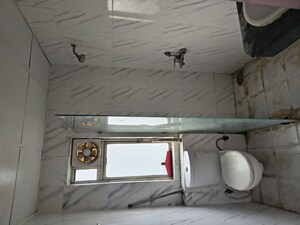 Bathroom in 2.5 BHK Apartment at Nimbus The Golden Palm, Sector 168 – for Rent