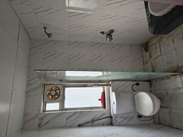 Bathroom in 2.5 BHK Apartment at Nimbus The Golden Palm, Sector 168 – for Rent