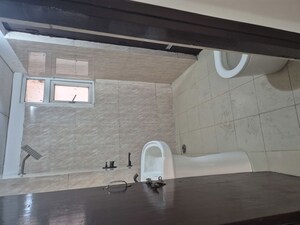 Bathroom in 3 BHK Apartment at Amrapali Princely Estate, Sector 76 – for Rent