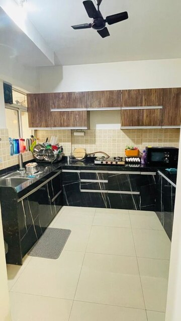 Kitchen in 3 BHK Apartment at Global Precioso Apartment, Kharadi – for Rent